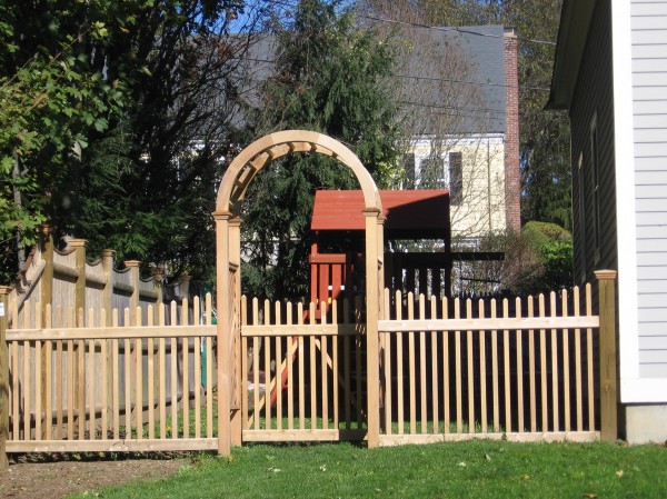 : Picket Fence With New England Arbor Design