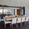 Simple-Neat-Elegant-Interior-with-Wooden-Table-and-White-Chairs-design